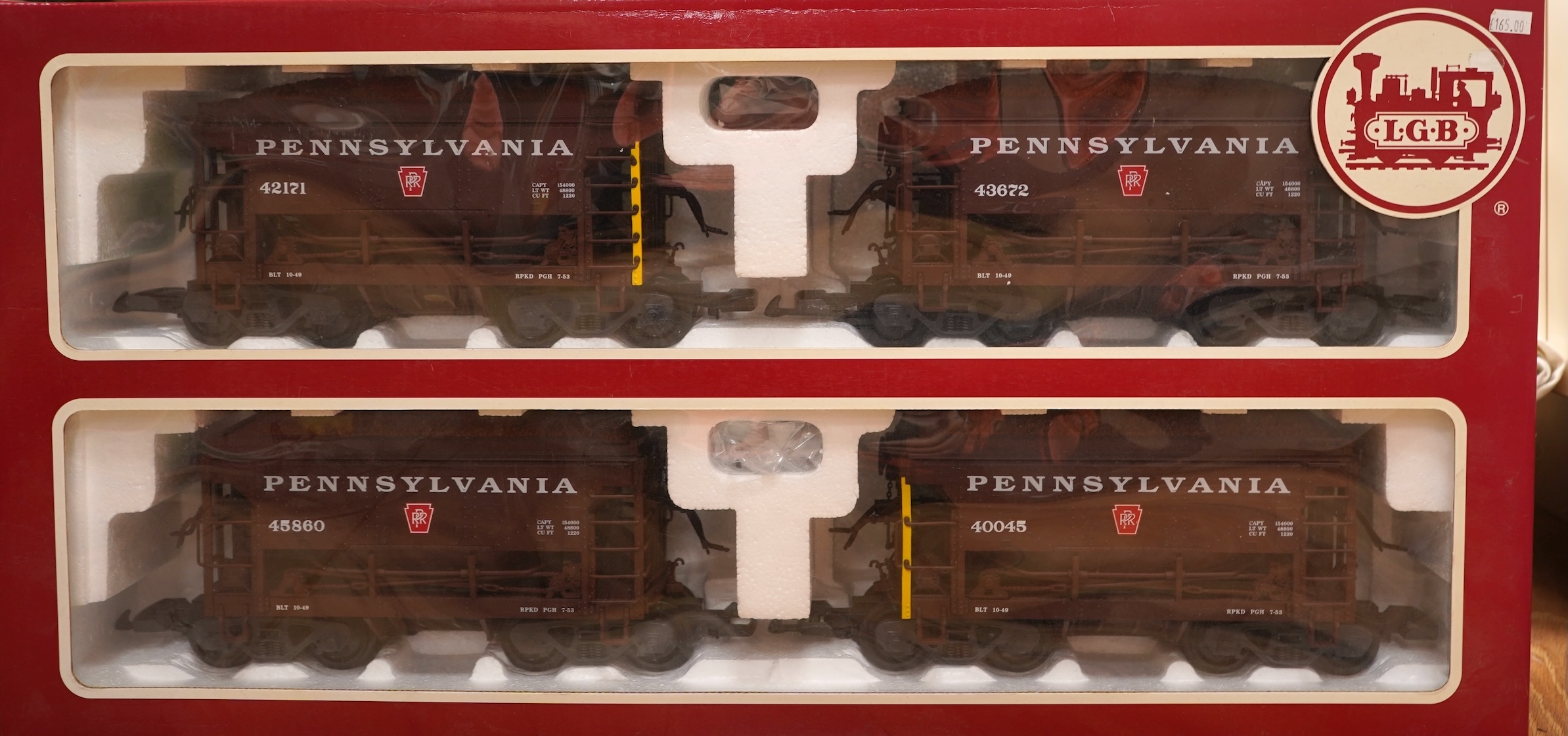 A boxed G scale (45mm) LGB set of four hopper wagons (40045). Condition - good.
